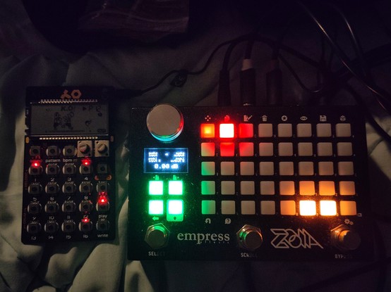 Pocket operator KO on the left, Empress ZOIA on the right, only four lights activated on the grid