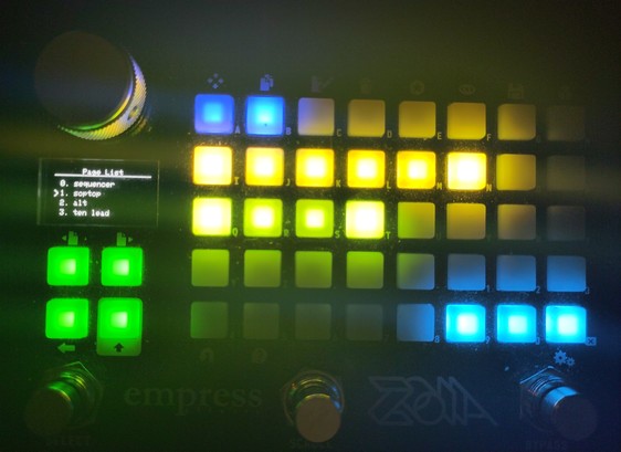 Empress ZOIA on a partially-lit page of patches, with the screen on the left showing the names of some of the pages: sequencer, sop top, alt, and ten lead